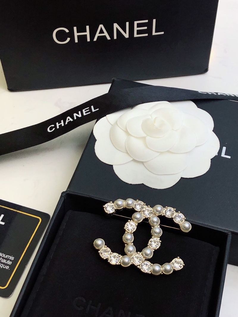 Ch**el brooches